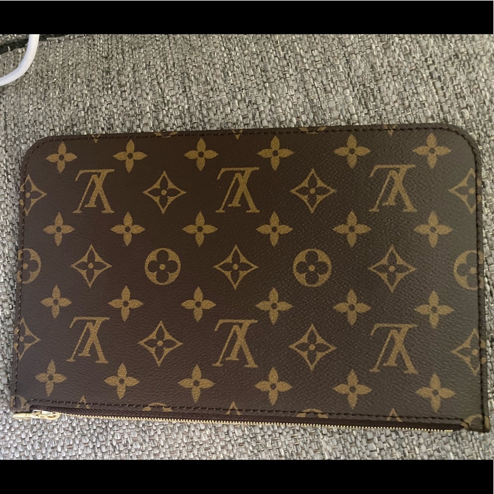 Brand New never used !!! Authentic Louis Vuitton GM monogram wristlet.